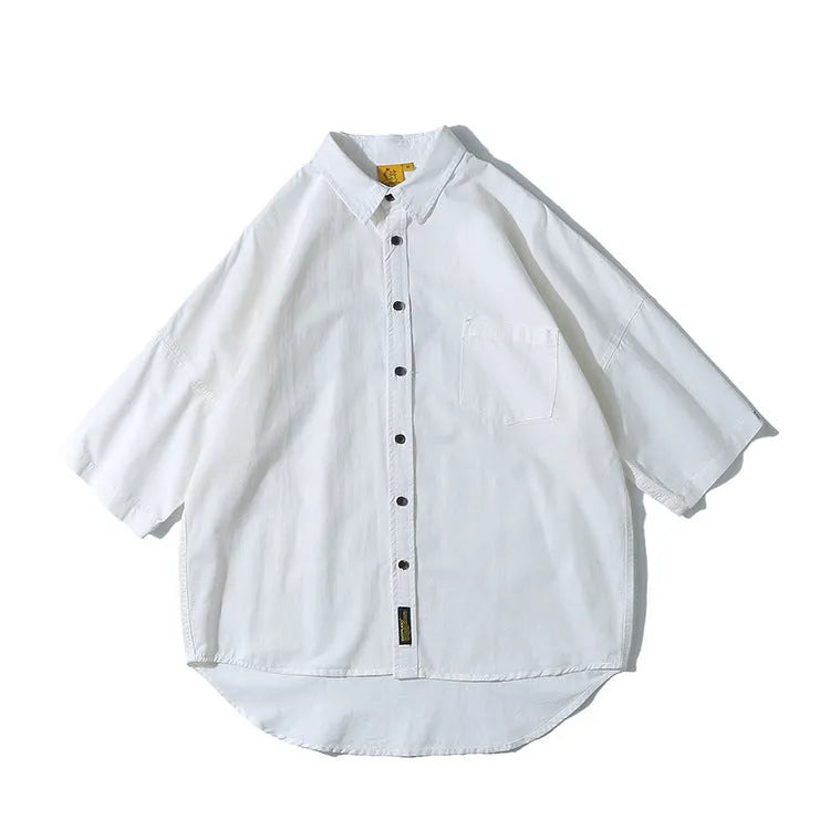 Man wearing a loose-fit Japanese style cotton cardigan shirt in a summer colour.