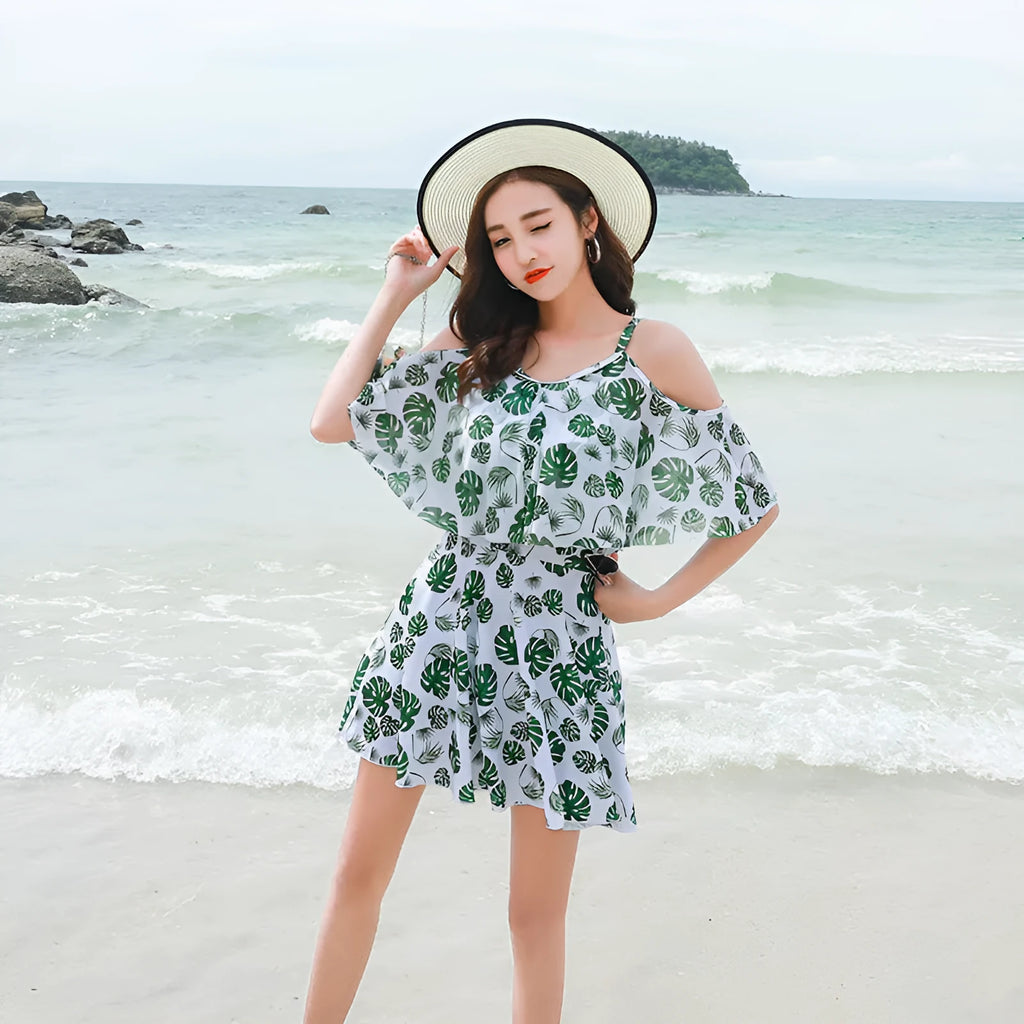 Women's personalised one-piece swimsuit in polyester with green leaf or black letter style print