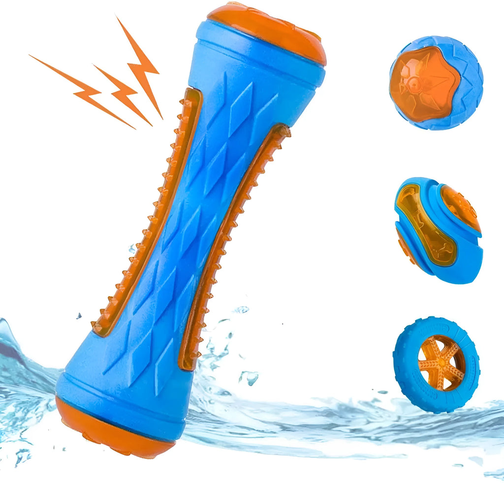 Set of three TPR dog toys: a red ball, a blue barbell, and an orange tire, floating in water.