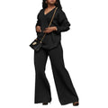 Women's brown thickened velvet two-piece suit with split sleeve top and trousers on a hanger.