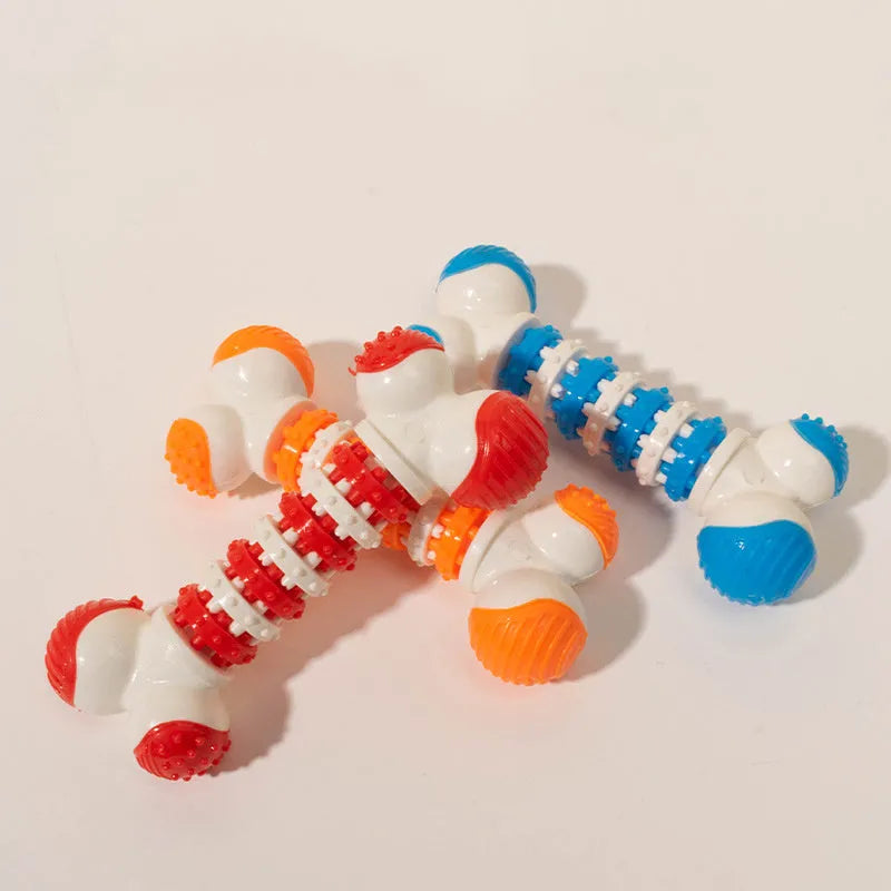 Blue, orange, and red bone-shaped interactive dog chew toy with textured ends and treat compartment.