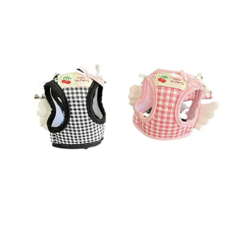 Soft cotton chest and back harness for a small dog, with hand-holding rope, shown in pink colour.