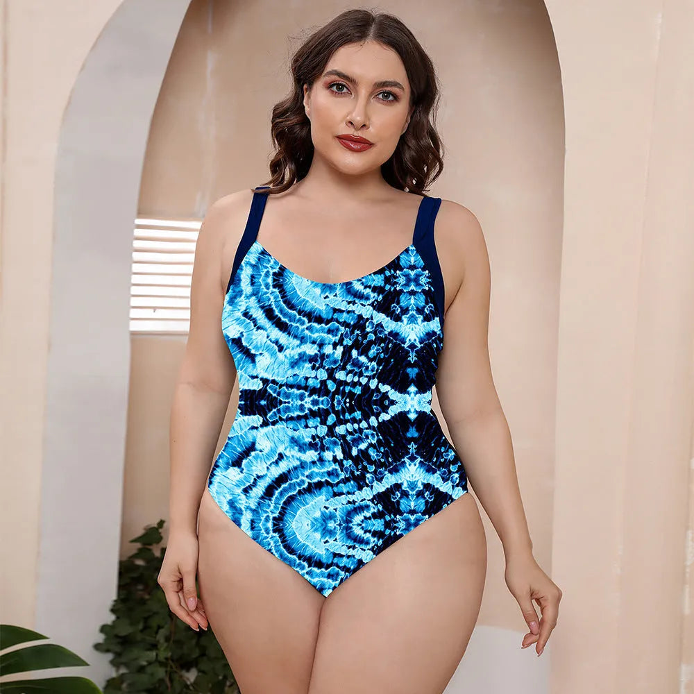 Floral print one-piece swimsuit with spaghetti straps and conservative vest design