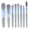 8-piece Morandi makeup brush set with fibre hair bristles in pink, blue, apricot, and green on a light background