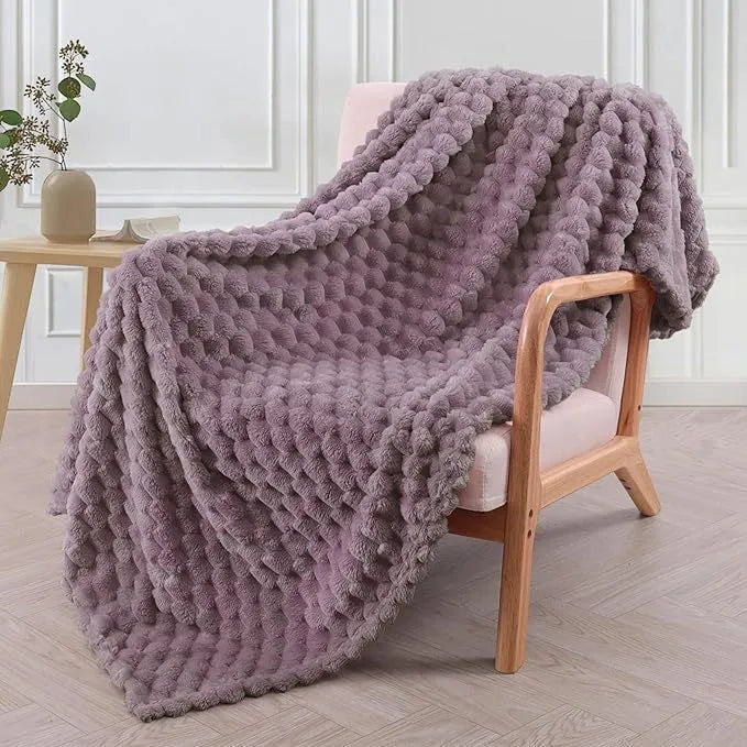 Children's soft plaid polyester blanket shown in camel colour, suitable for nap time.