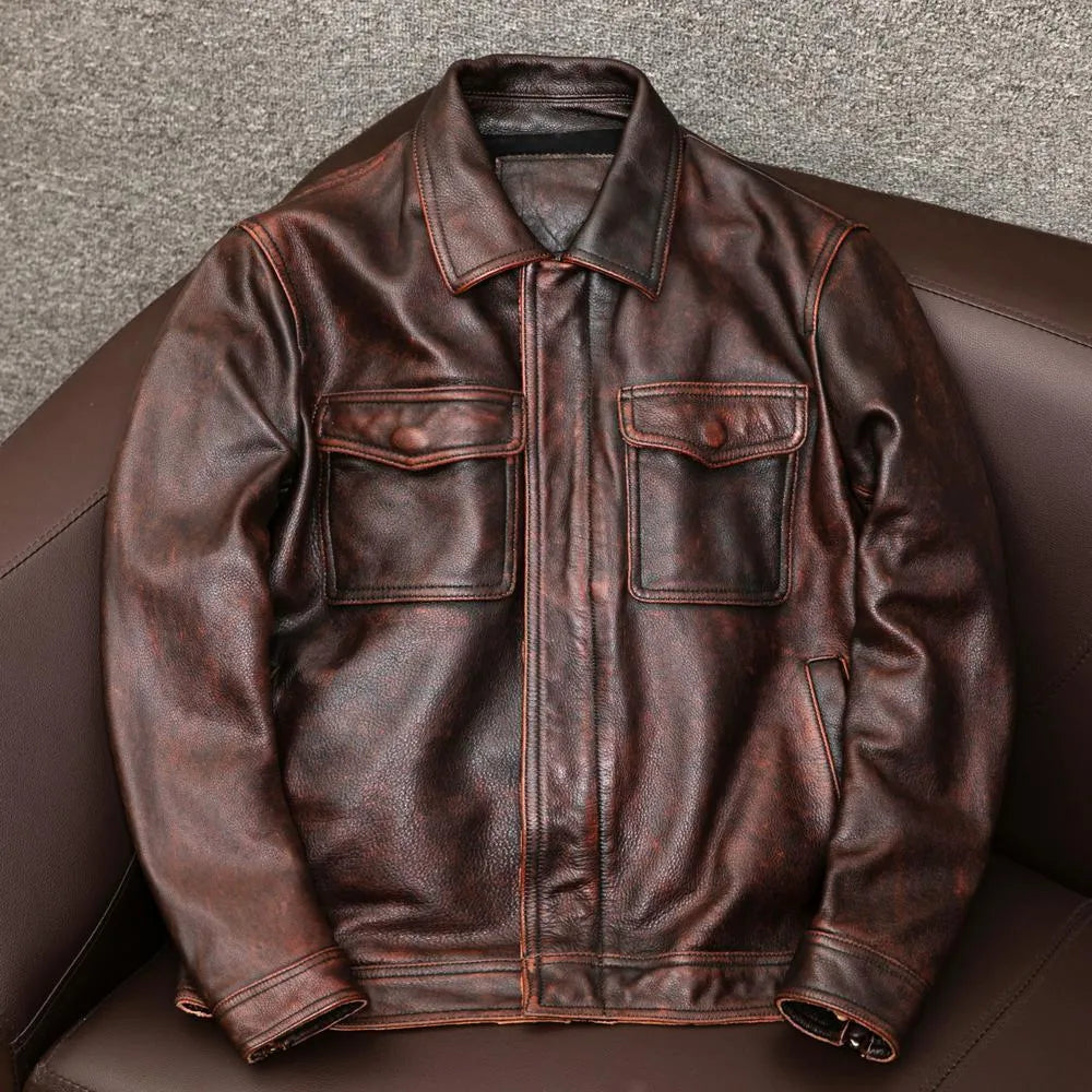 A man's black plus size PU leather jacket with a lapel and side pockets, shown on a hanger.