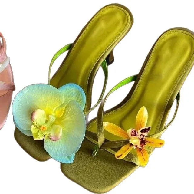 Handmade women's asymmetric flower sandals with high heel and square toe in black, green, pink, or white
