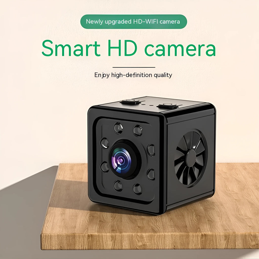 Black K13 cube-shaped remote sports camera with mounting bracket on a white background.