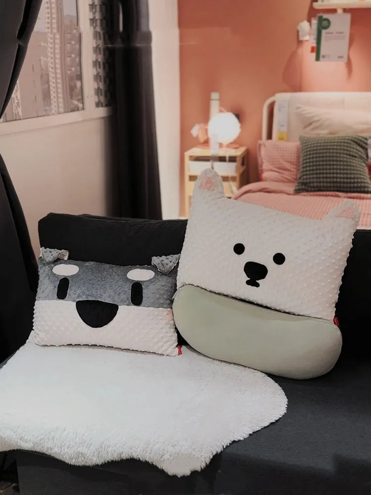 Grey and white dog breed decorative pillow cushion on a sofa, measuring 50cm by 35cm.