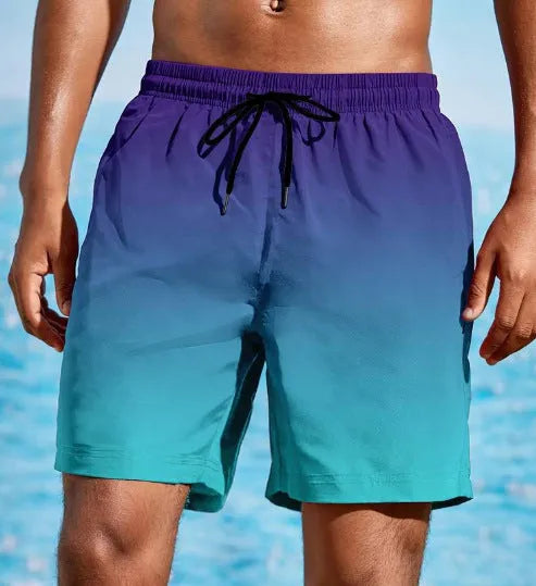 Men's grey gradient colour 3D digital print mesh sports shorts on a white background.