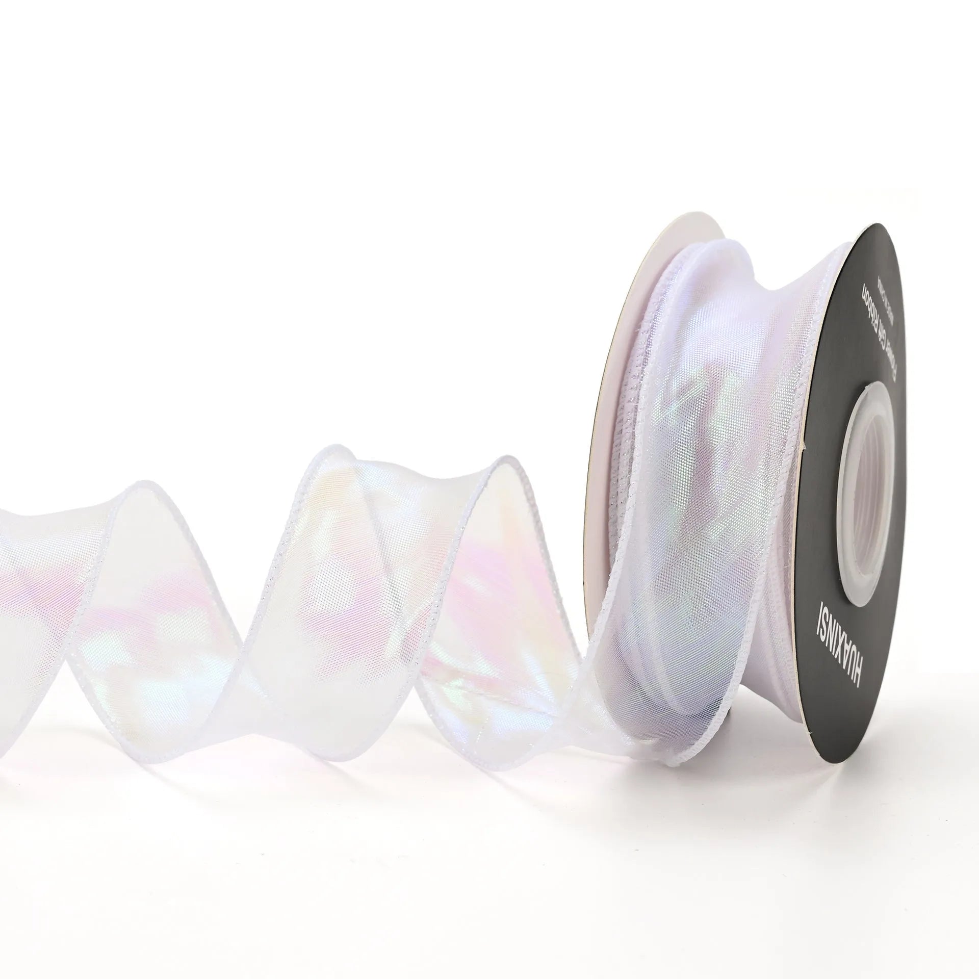 Roll of 4cm wide colourful mesh ribbon with fishtail yarn floral wave design.
