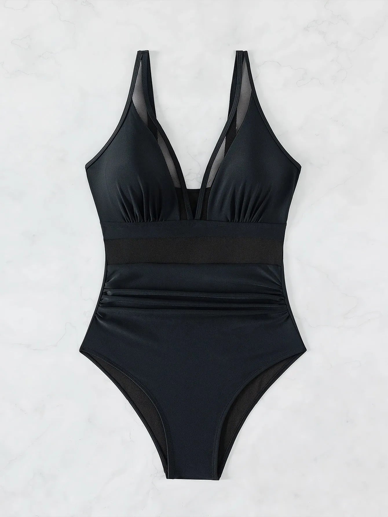 Black halter neck one-piece swimsuit with bikini style briefs, made from nylon fabric.