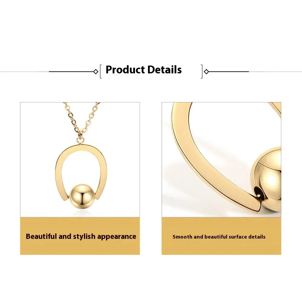 Gold tone stainless steel necklace with geometric pendant on a cross chain, shown adjusted to a medium length.