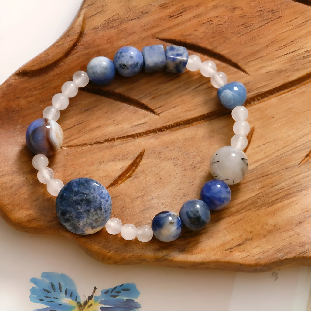 Hand-woven natural stone bracelet with blue point and black hair crystal agate beads