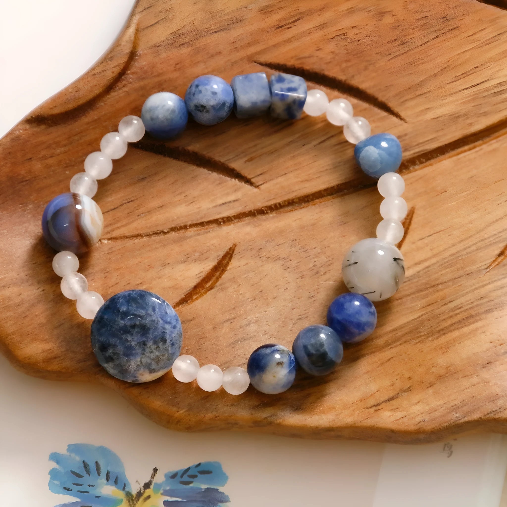 Hand-woven natural stone bracelet with blue point and black hair crystal agate beads