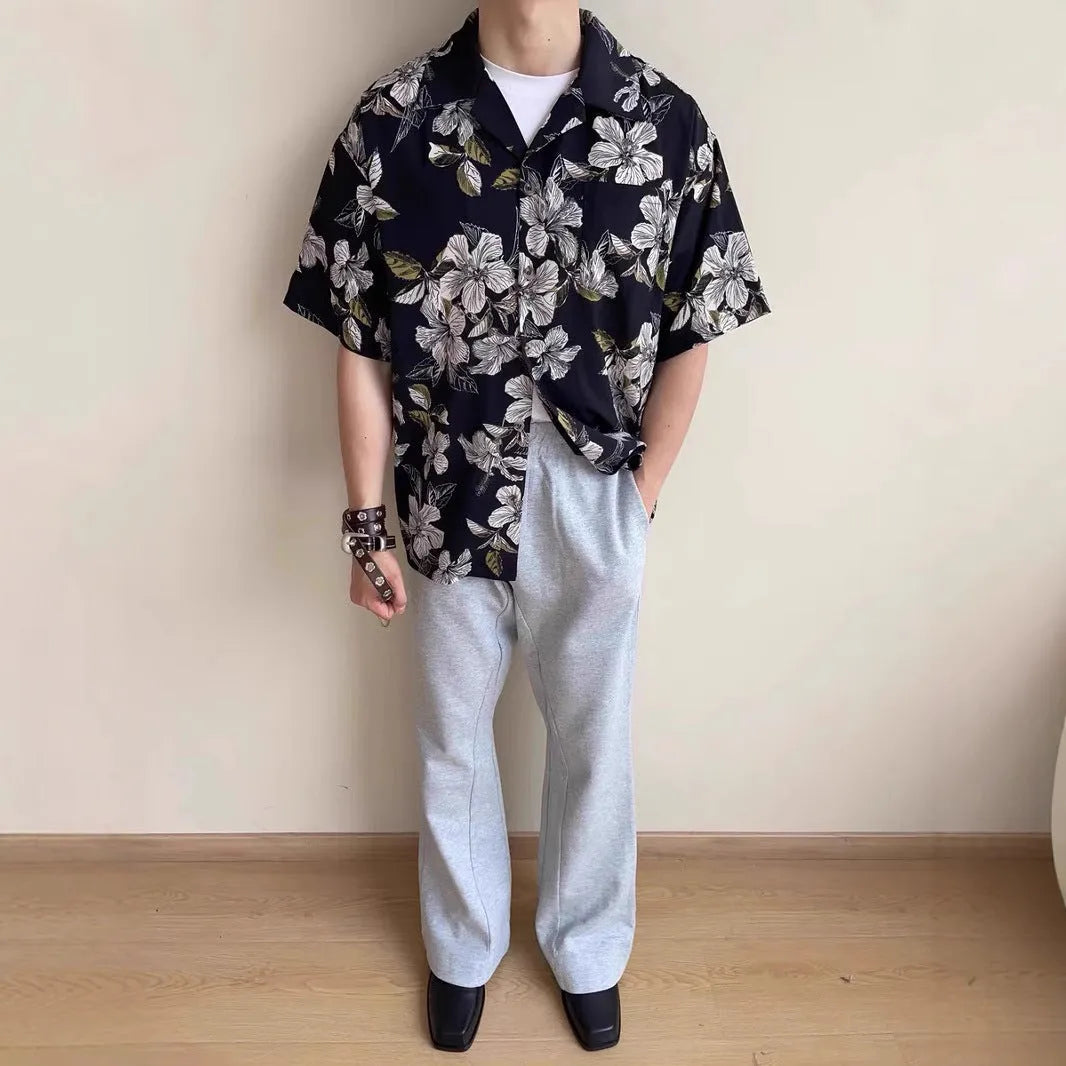 Black men's vintage Cuban collar shirt with printed floral pattern, made from thin ice silk fabric.