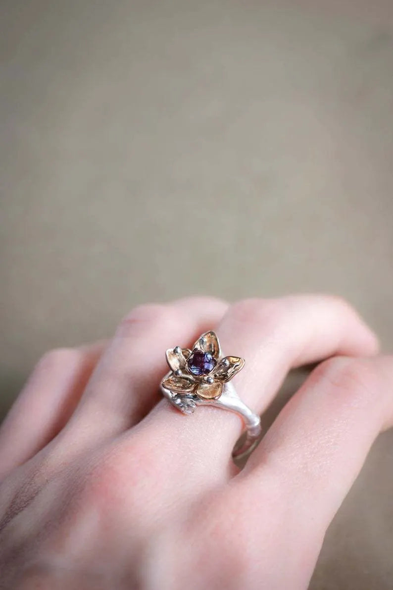 Silver two-tone floral geometric women's alloy ring shown on size guide from 5 to 11.
