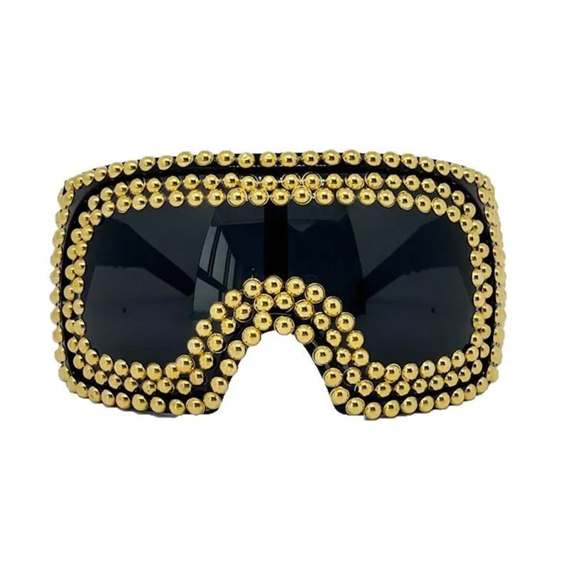 Men's square punk sunglasses with large 145mm frame and silver rivet details on a black background.