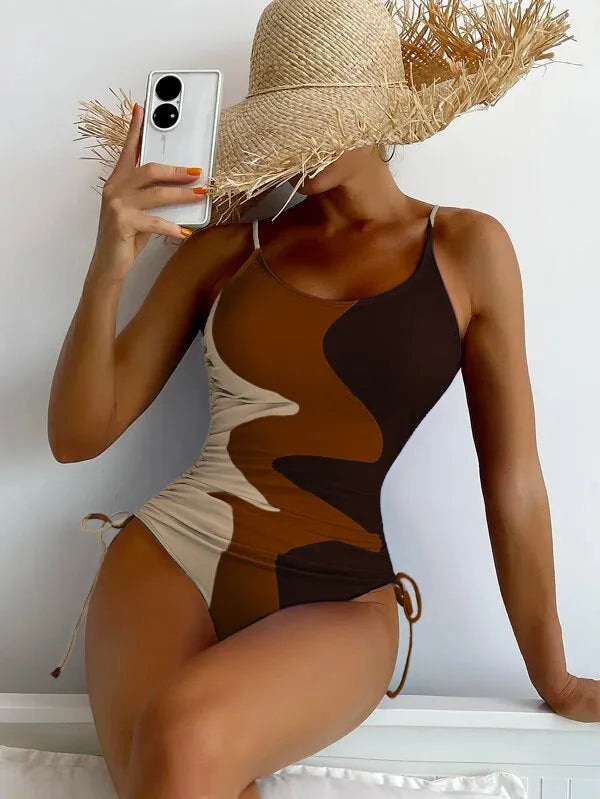 Women's sleeveless backless one-piece swimsuit in blue striped print