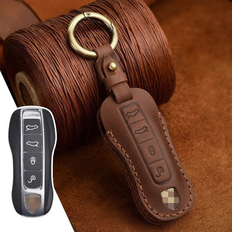 Porsche leather key cover with retro bag buckle in blue and brown colour options