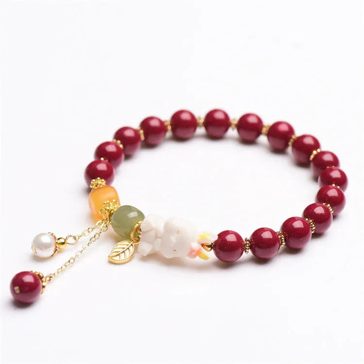 Natural cinnabar bracelet with rabbit design in traditional Chinese style