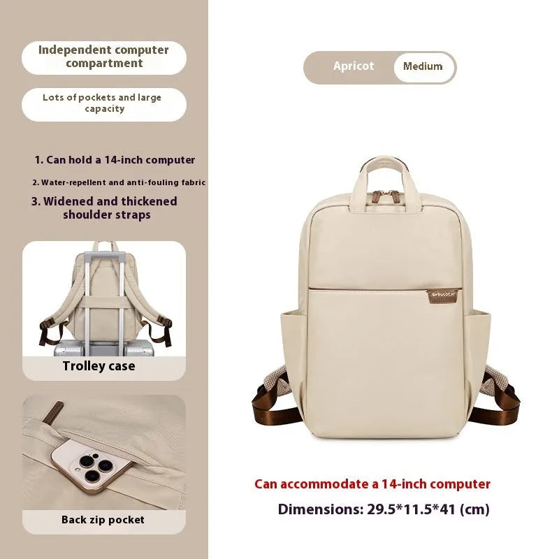 Women's nylon travel backpack showing laptop compartment and multiple internal organisers in apricot colour