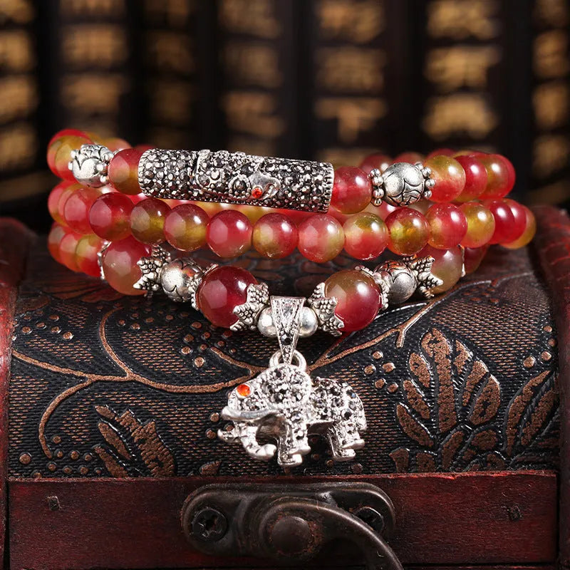 Handmade watermelon crystal bracelet with Chinese knot in 8mm or 6mm elephant style beads.
