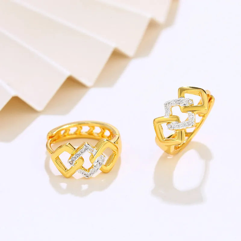 Gold geometric hollow-out earrings with electroplated finish and colour separation ear clip