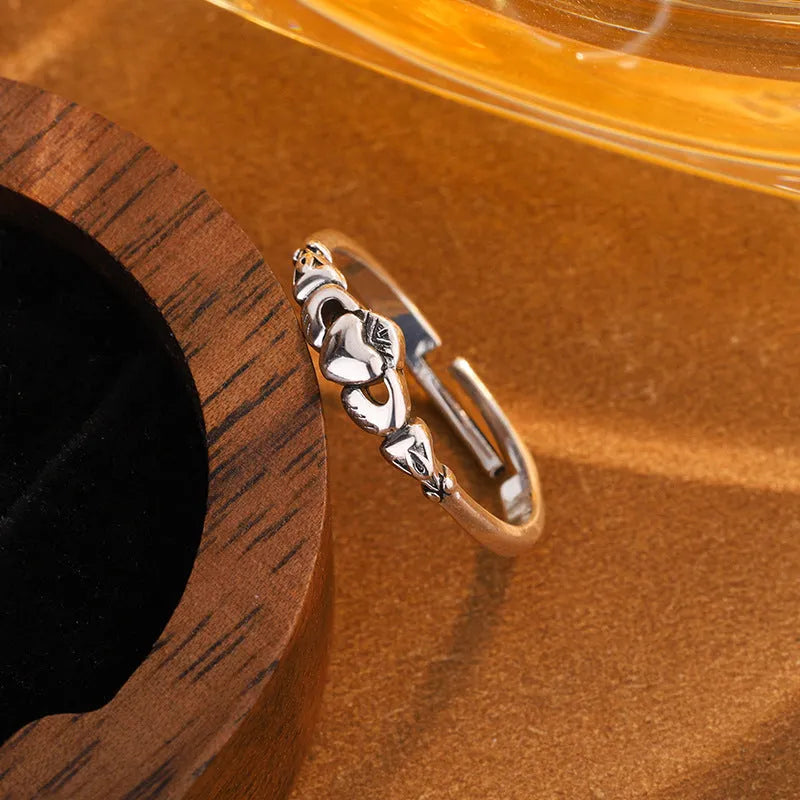 Retro silver heart-shaped open ring for women made from copper.