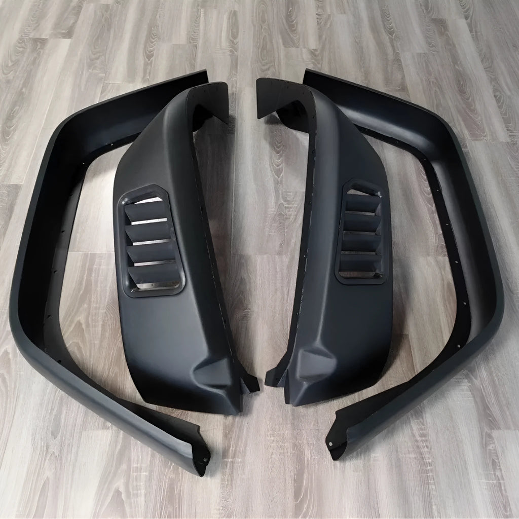 Black plastic car wheel arch set of four for universal fit on automobiles