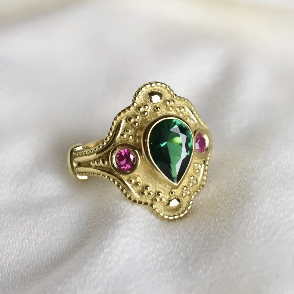 Women's golden Lvzuan geometric ring electroplated on alloy, shown on a hand