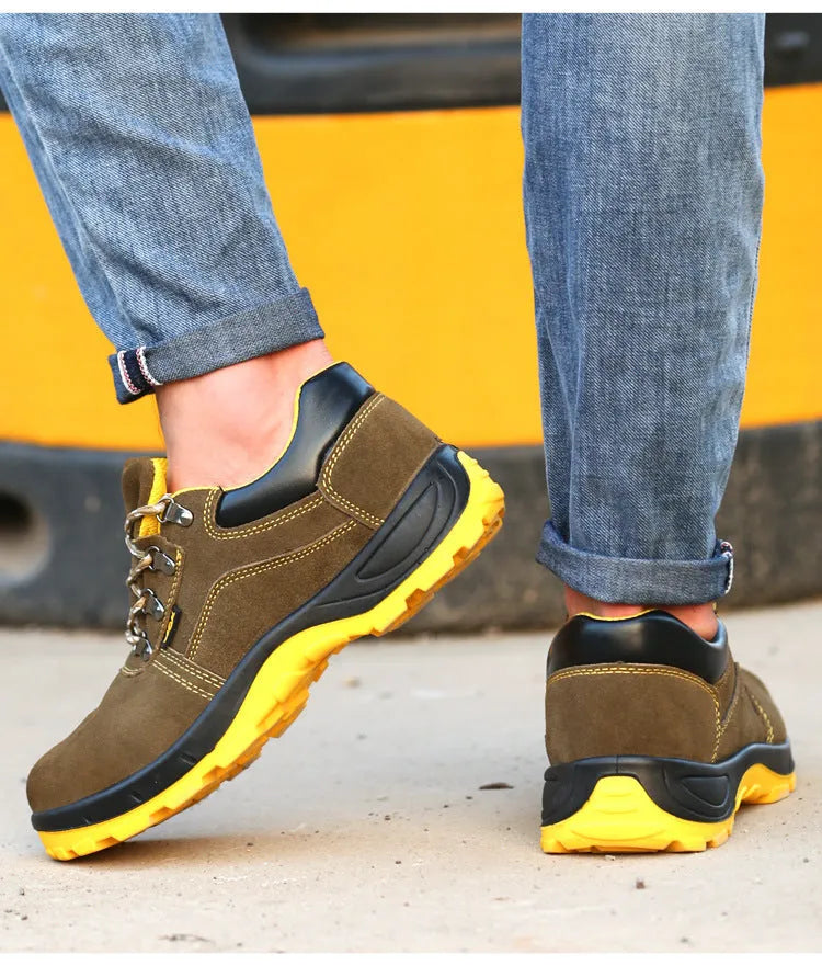 Bronze coloured cow suede leather safety shoes with a steel toe cap and low-cut design.