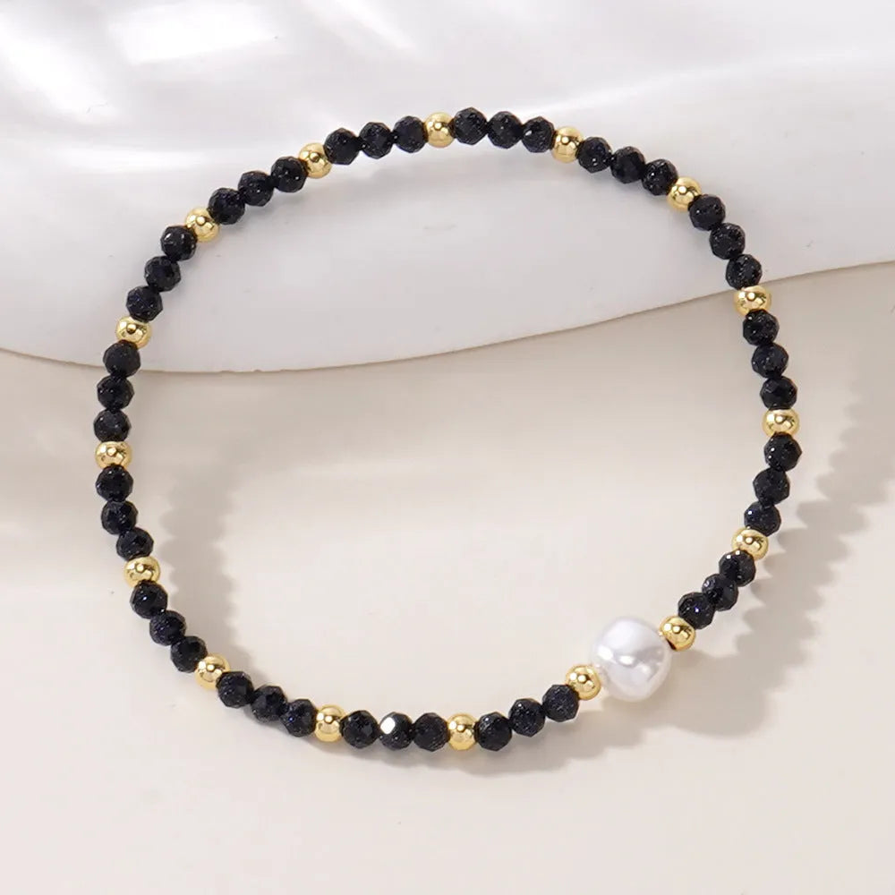 Natural stone geometric bracelet with elliptical elements showing colour variations BB24071801A to O