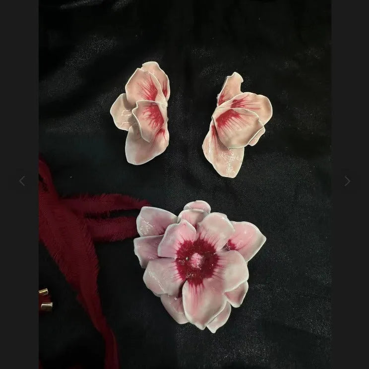 Pastoral style alloy floral stud earrings with oil-spot glaze finish in four colour options