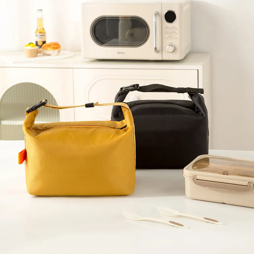 Army Green Japanese-style insulated lunch bag with a wide top opening on a grey background.