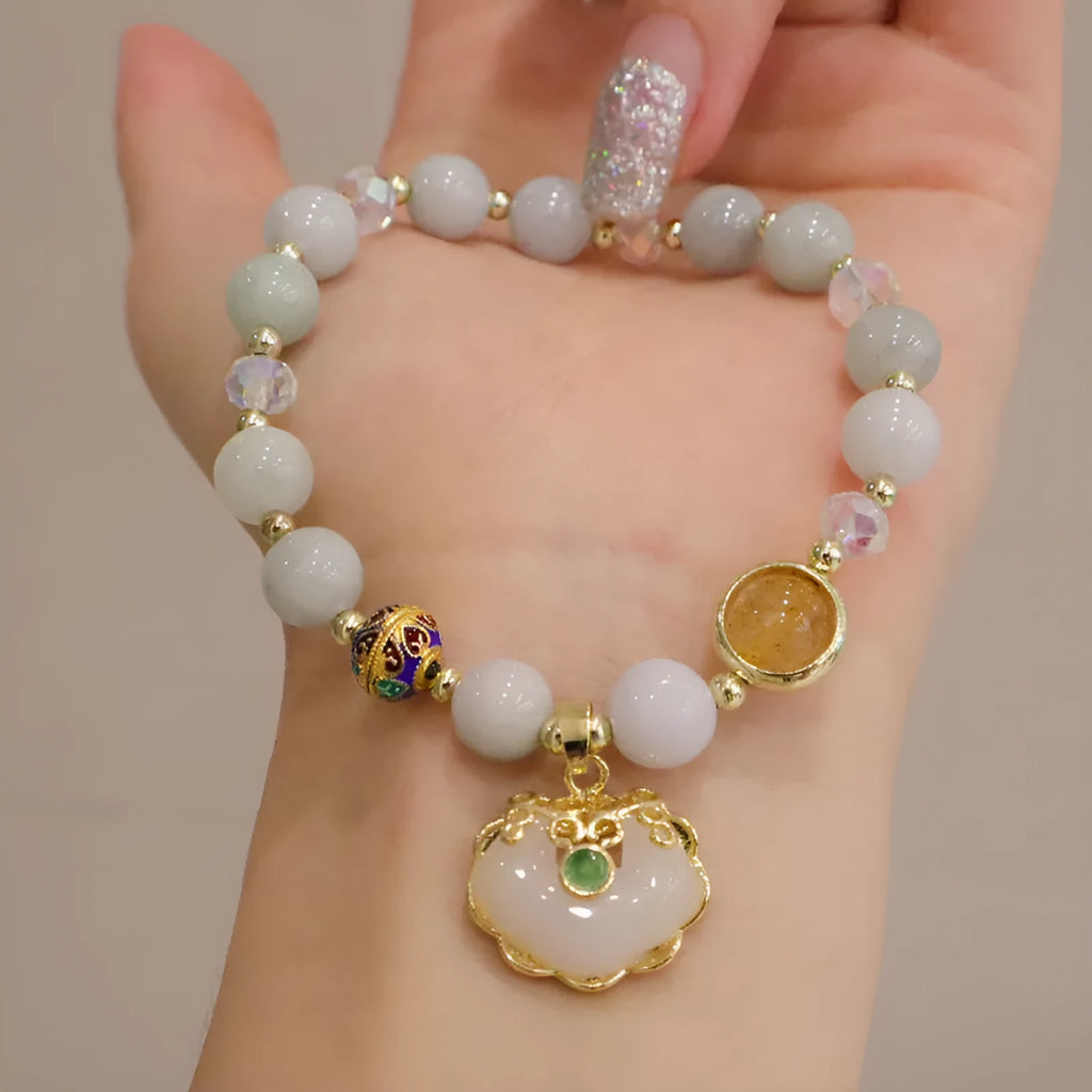 Women's geometric bracelet with strawberry quartz or gray jade stones and ethnic metal decorations
