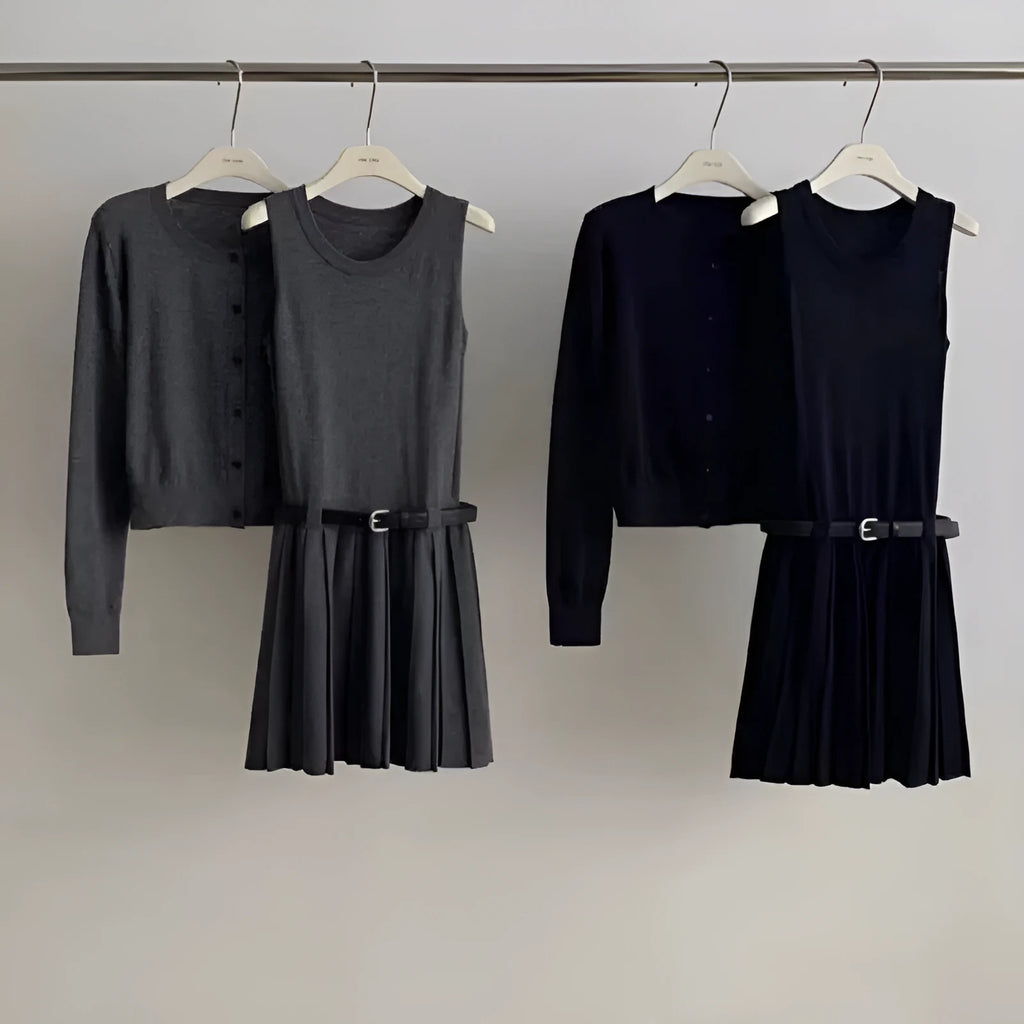 Grey art retro knitted two-piece set with 3D pattern, featuring a pleated vest skirt with belt and a V-neck long-sleeve cardigan.
