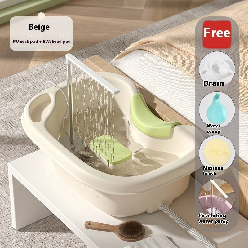 Light pink lying-in-bed shampoo basin with neck pillow and water pump
