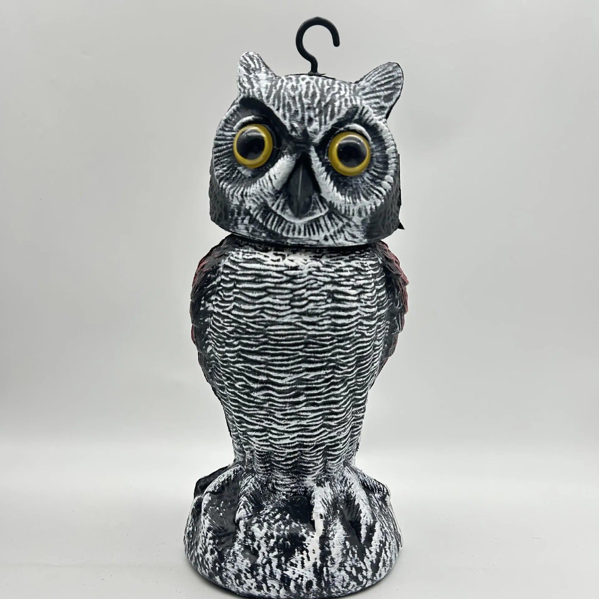 PE plastic artificial owl decoy with moving head, a bird scare ornament for outdoor use.