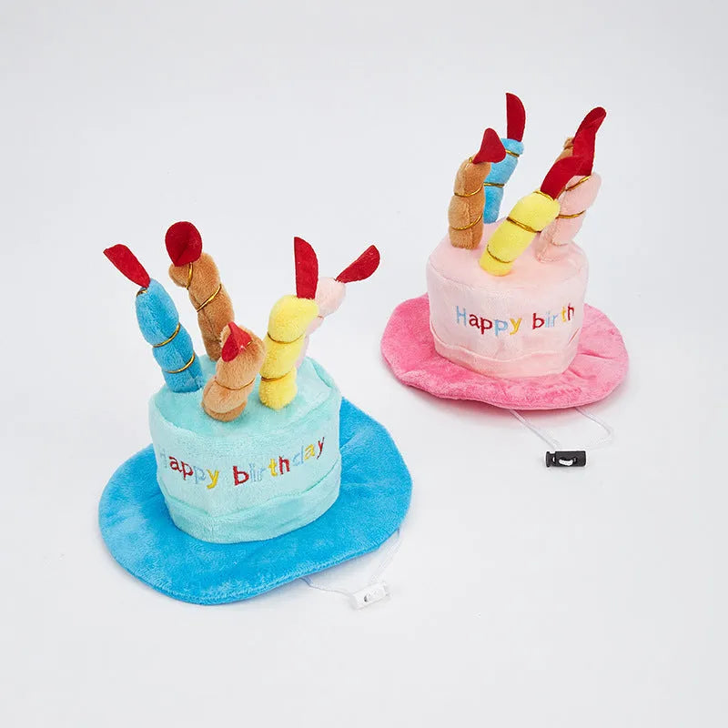 Blue and pink dog birthday hats showing 21cm by 15cm by 6.5cm dimensions