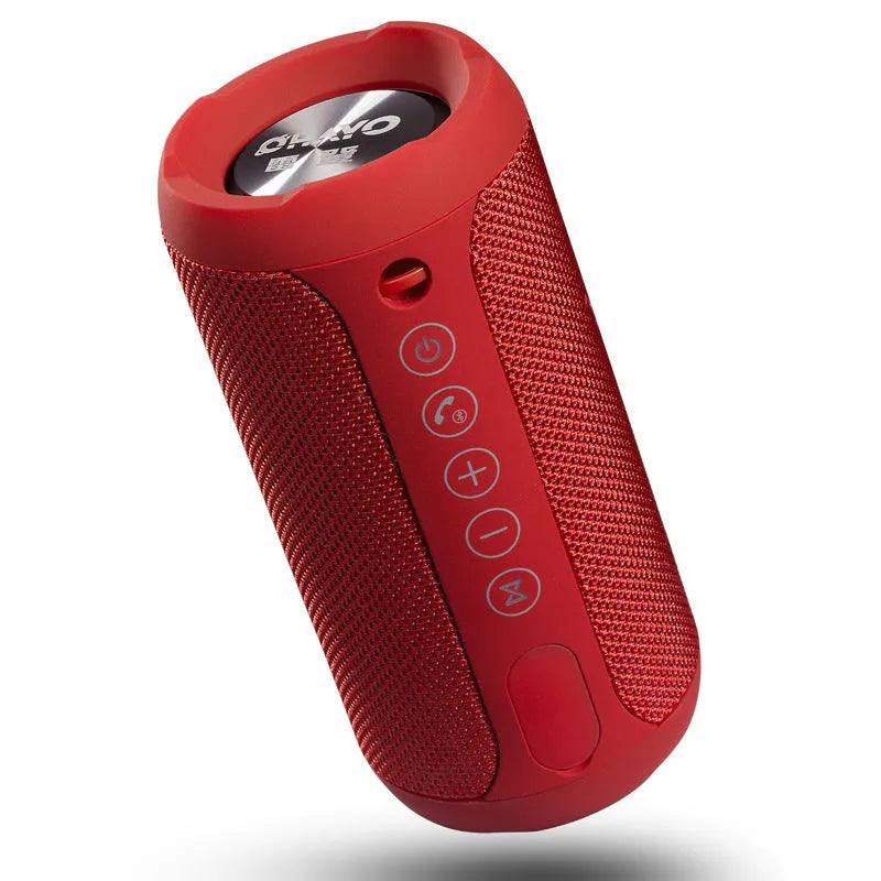 Outdoor portable Bluetooth speaker in camouflage colour with buttons for volume, playback, and mode selection.