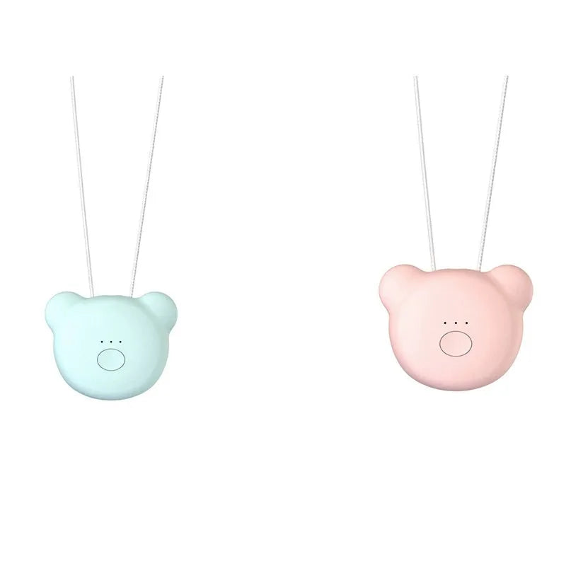 Pink portable USB air purifier necklace with charging cable showing compact wearable design
