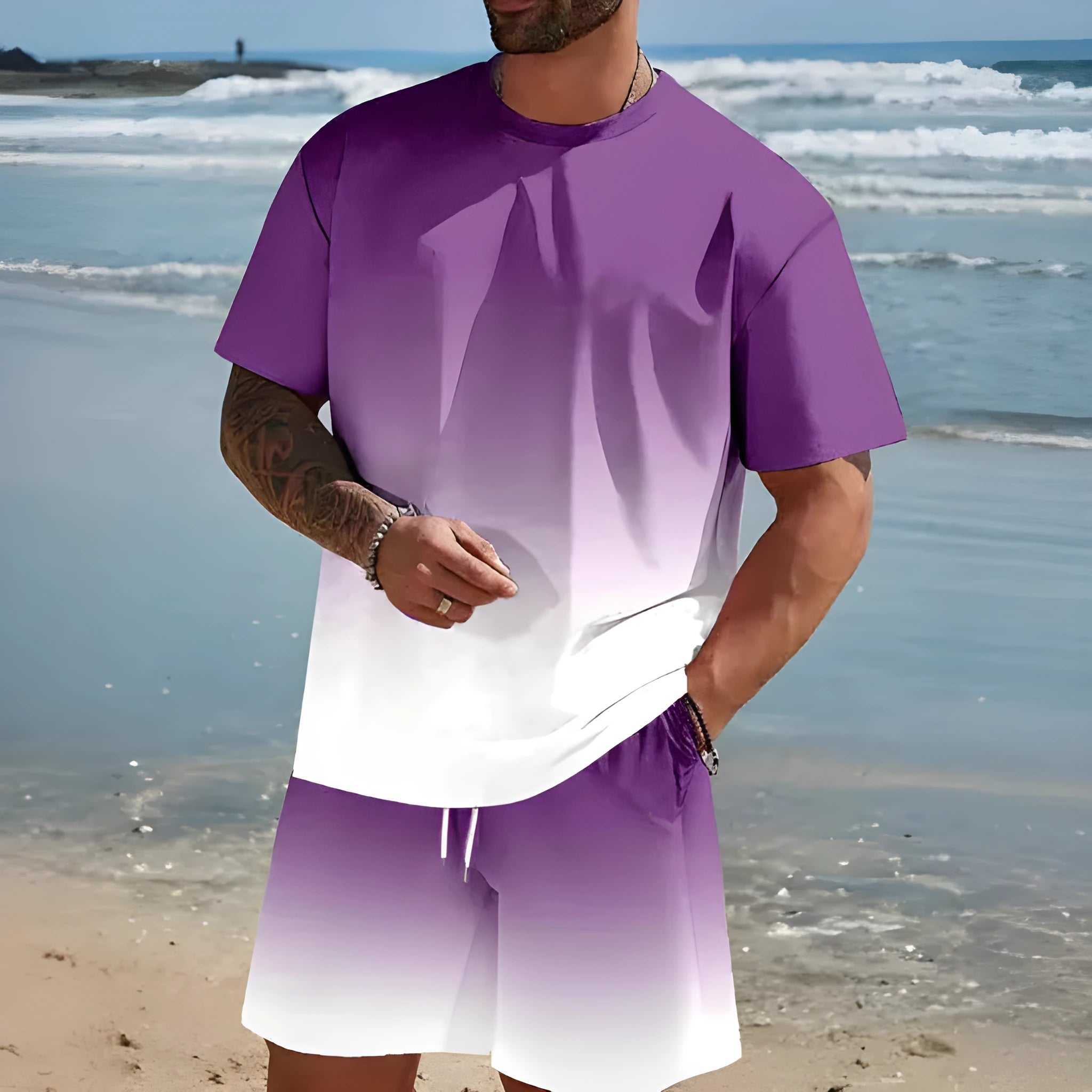 Man wearing a loose light blue short-sleeved t-shirt and matching shorts from a polyester summer set.