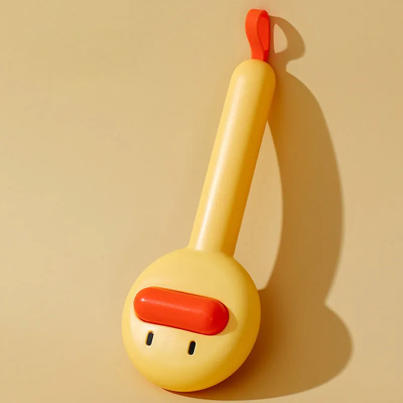 Small yellow duck-shaped pet comb with open needle design for cat and dog grooming