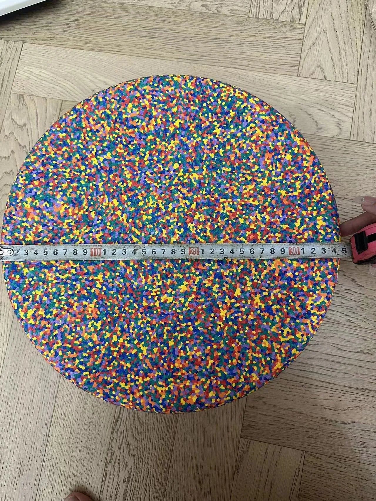 Plastic wood-grain surf balance board for a child aged 4-6 years.