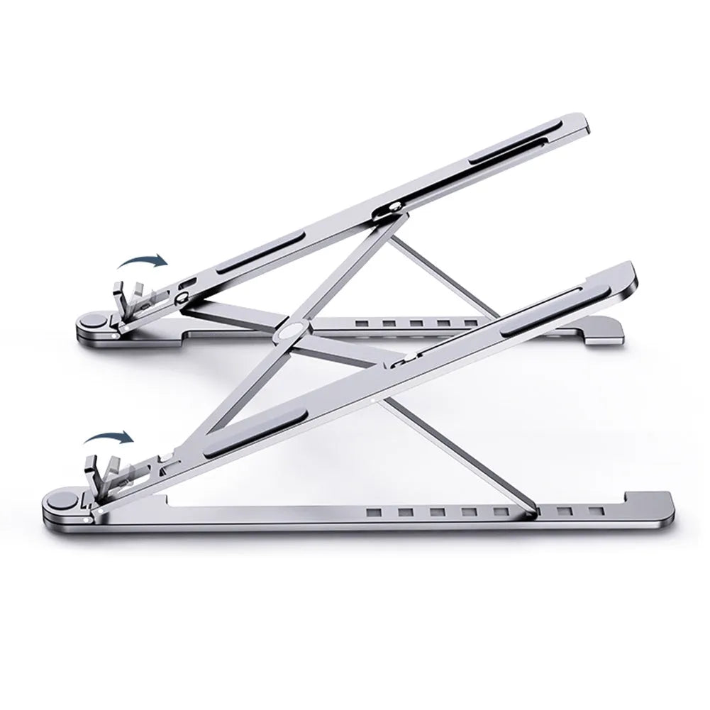 Silver aluminium folding laptop stand adjusted to medium height with a laptop in place.