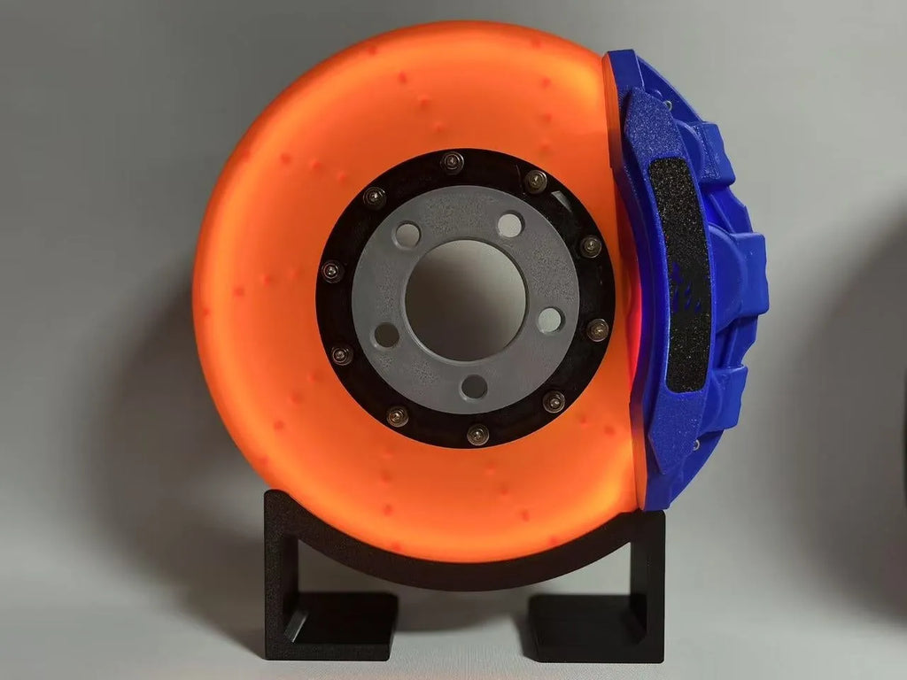 Brake disc themed LED desktop night light in blue caliper colour with touch control