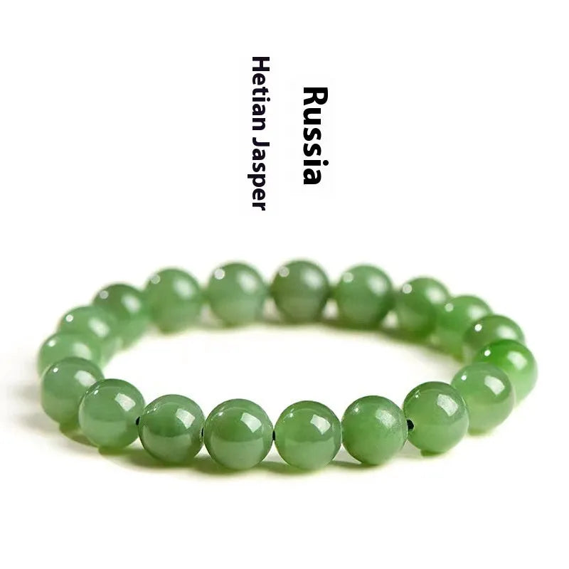 Polished natural jasper bead bracelet in Hetian jade, showing multiple bead size options on a wrist.