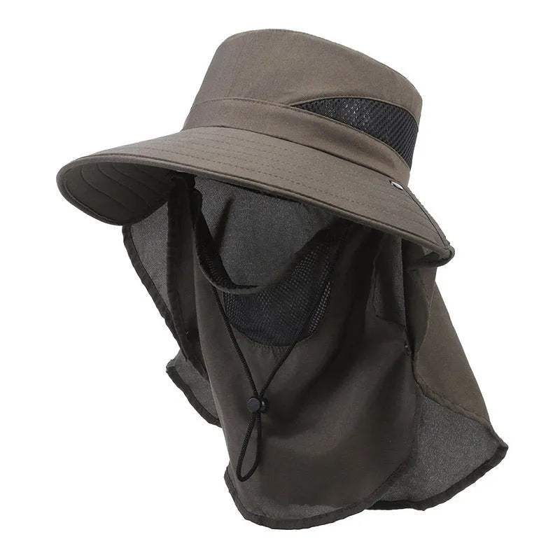 Men's grey fisherman hat with wide brim, shown from the side on a wooden post outdoors.
