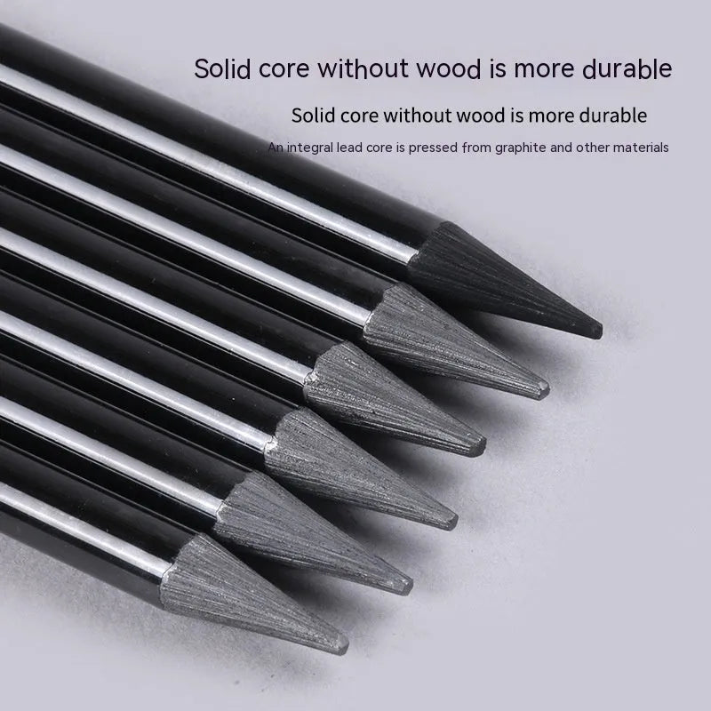 Set of six graphite and three carbonised art pencils in suction card packaging.